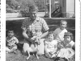 1955 Aug Uncle Tom with dog and kids.jpg